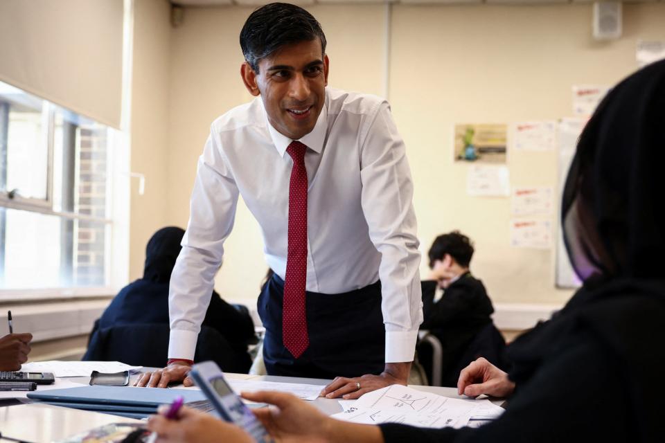 Mr Sunak visiting Harris Academy in Battersea on Friday (REUTERS)