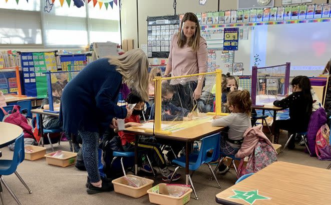 Paraprofessionals work in a kindergarten class in the Twin Falls School District in Idaho. The district has been struggling to fill positions this year. (Twin Falls School District)