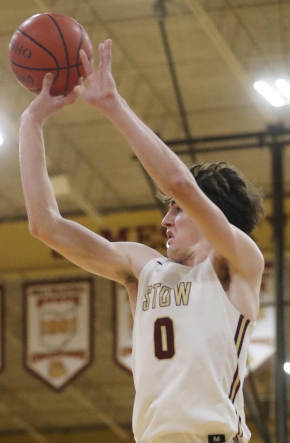 Stow's Reece Raymond-Smith fires off a shot against Walsh Jesuit during their game at Stow-Munroe Falls High School on Tuesday. Stow beat Walsh 45-41.
