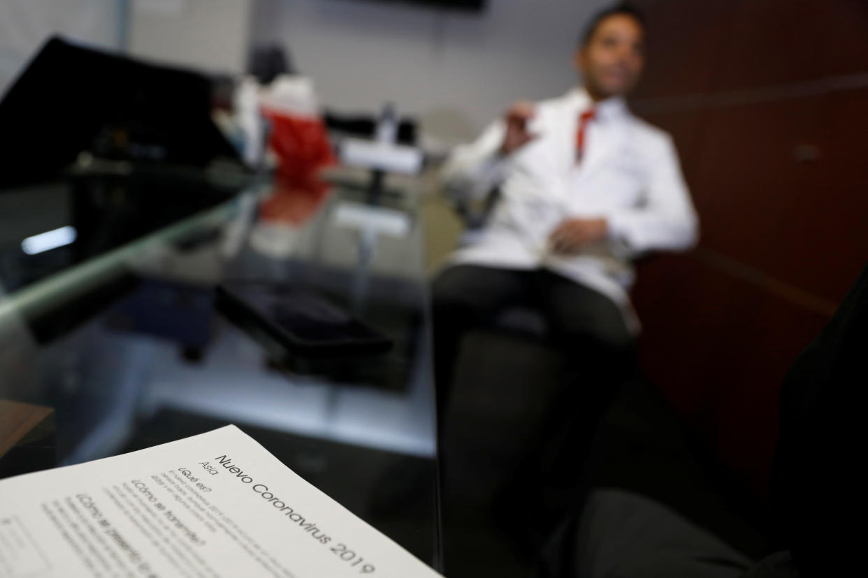 Information about the new coronavirus is seen on the desk of doctor Jorge Baruch Diaz inside a clinic at Benito Juarez international airport in Mexico City, Mexico January 22, 2020. REUTERS/Carlos Jasso