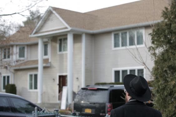 The home is said to belong to Rabbi Chaim Rottenberg, who leads the synagogue next door (AP)