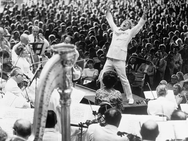 <p>Bettmann</p> Leonard Bernstein at the climax of Mahler's Resurrection symphony performed by the Boston Symphony in Lenox, Massachusetts on July 8, 1970.