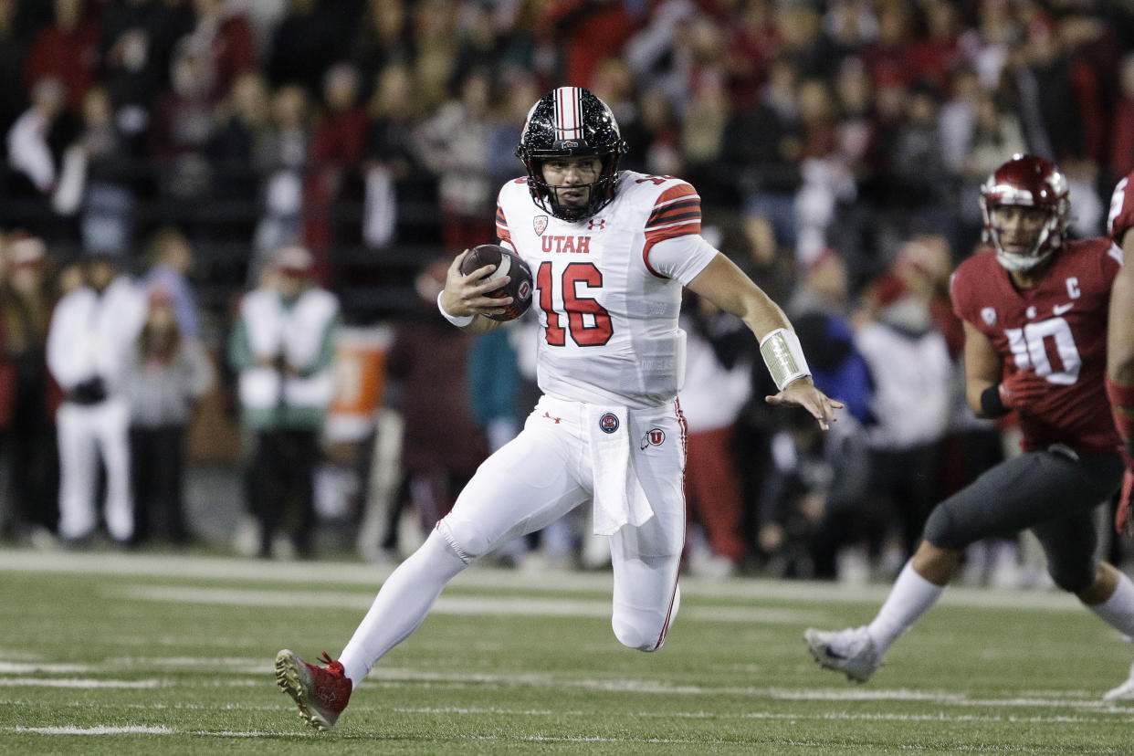 Utah quarterback Bryson Barnes (16) carries the ball during the first half of an NCAA college football game \W|, Thursday, Oct. 27, 2022, in Pullman, Wash. (AP Photo/Young Kwak)