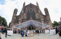 Queen Elizabeth II and Prince Philip, Duke of Edinburgh, look on as balloons are released outside Hereford Cathedral as part of the Diamond Jubille celebrations this year.