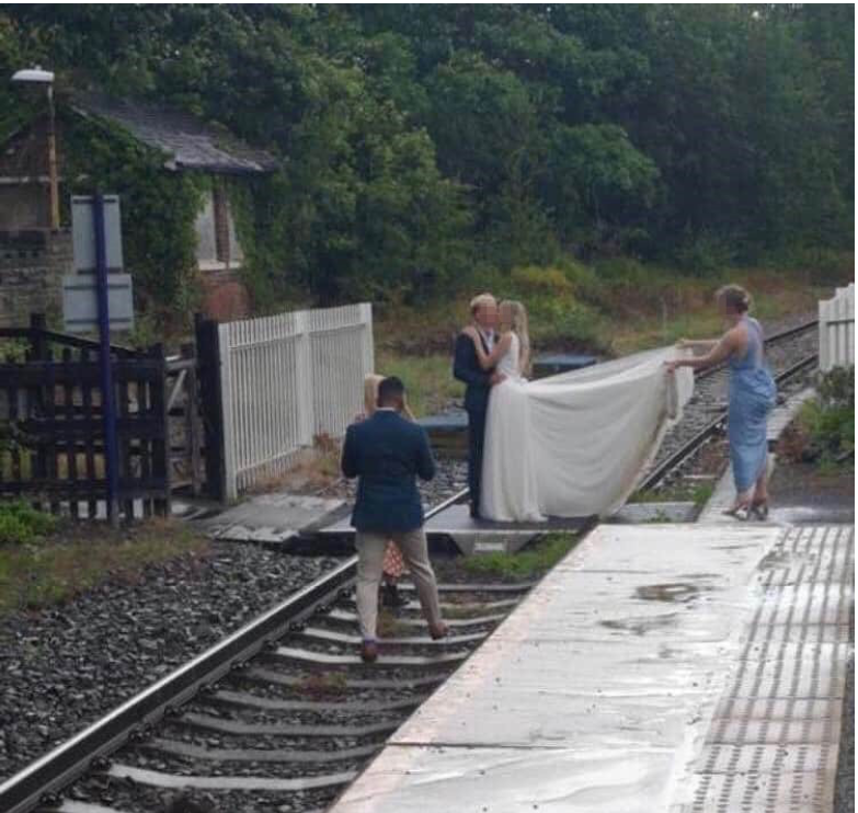 Network Rail has slammed a couple for taking their wedding pictures on the train tracks. Source: Network Rail