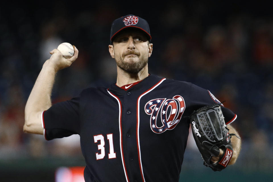 Washington Nationals starting pitcher Max Scherzer throws to the Atlanta Braves during the first inning of a baseball game Friday, Sept. 13, 2019, in Washington. (AP Photo/Patrick Semansky)