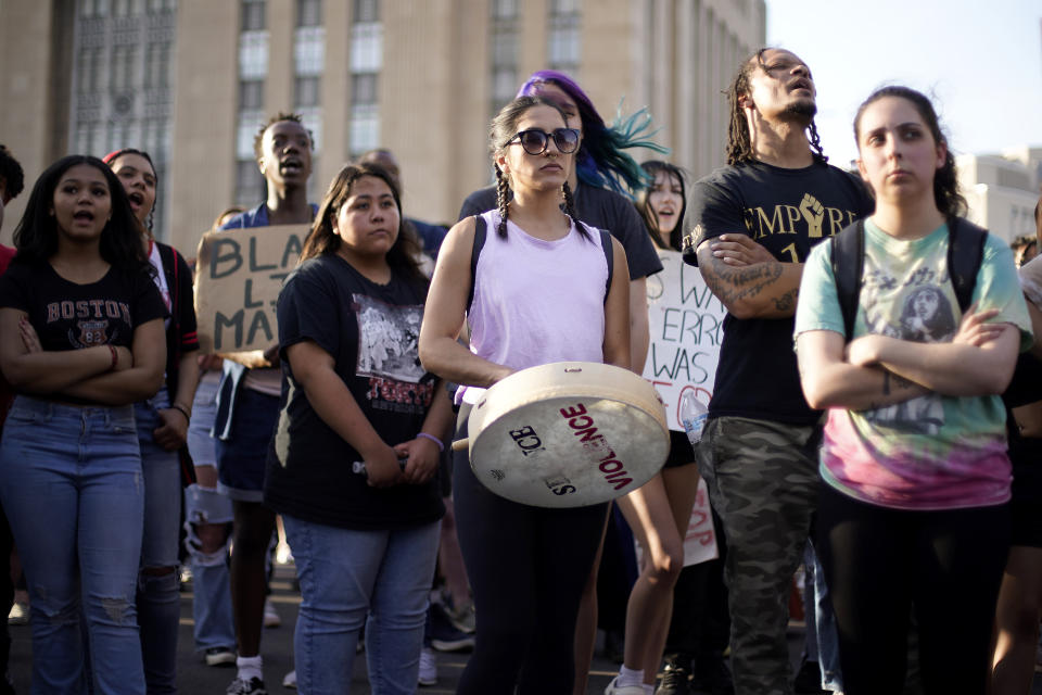 People gather at a rally to support Ralph Yarl, Tuesday, April 18, 2023, in Kansas City, Mo. Yarl, a Black teenager, was shot last week by a white homeowner when he mistakenly went to the wrong address to pick up his younger brothers. (AP Photo/Charlie Riedel)