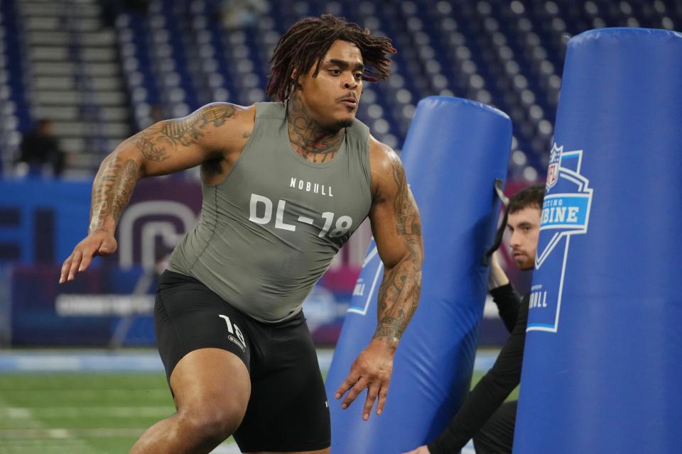 Feb 29, 2024; Indianapolis, IN, USA; Texas defensive lineman Byron Murphy (DL18) works out during the 2024 NFL Combine at Lucas Oil Stadium. Mandatory Credit: Kirby Lee-USA TODAY Sports