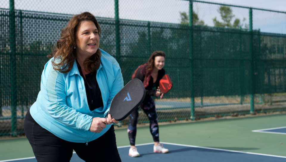 Carol Ann DeMarco as "Jane," left, and Leigh Anne West as "Camille," right, are seen on the set of "Pickleball is Life: Dill With It!"