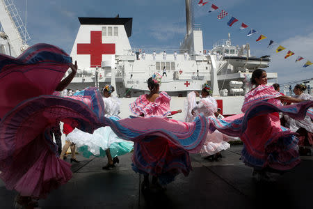 Members of the Chinese People Liberation Army Navy stand at the China's People's Liberation Army (PLA) Navy hospital ship Peace Ark, during its arrival ceremony at the port in La Guaira, Venezuela September 22, 2018. REUTERS/Manaure Quintero