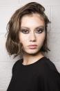 <p>Airy, bouncy, cloud-like curls backstage at Nicole Miller.</p>