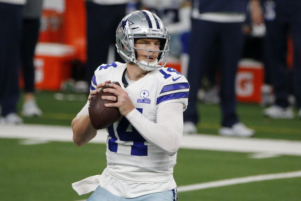 Dallas Cowboys quarterback Andy Dalton (14) drops back to pass in the second half of an NFL football game against the New York Giants in Arlington, Texas, Sunday, Oct. 11, 2020. (AP Photo/Michael Ainsworth)