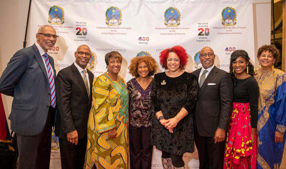 The Tucker family poses with Nikole Hannah-Jones, Creator of the New York Times 1619 project during an event honoring the 400th year anniversary of the first 20+ Angolans to arrive in America on Monday, Dec. 16, 2019 at the Smithsonian Museum of African Art.  The Tucker family of Hampton, Va., including Wanda Tucker, the main subject of USA TODAY's 1619 project, was honored by the Embassy of Angola on Dec. 16, 2019 during a program marking the 400th year since the arrival of enslaved Angolan people (including Tucker ancestors) to what is now Virginia. The program took place at the Smithsonian Museum of African Art in Washington.