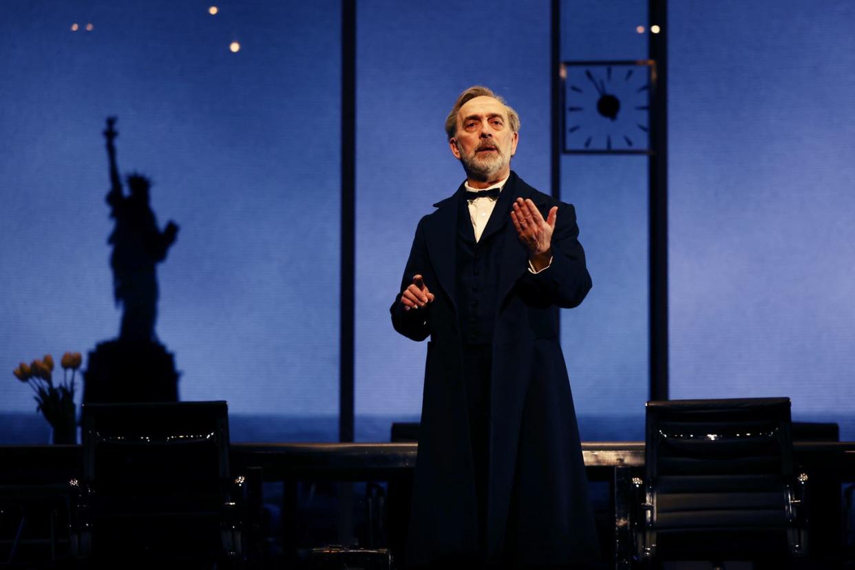 adrian schiller performing on stage during the lehman trilogy show, february 2024