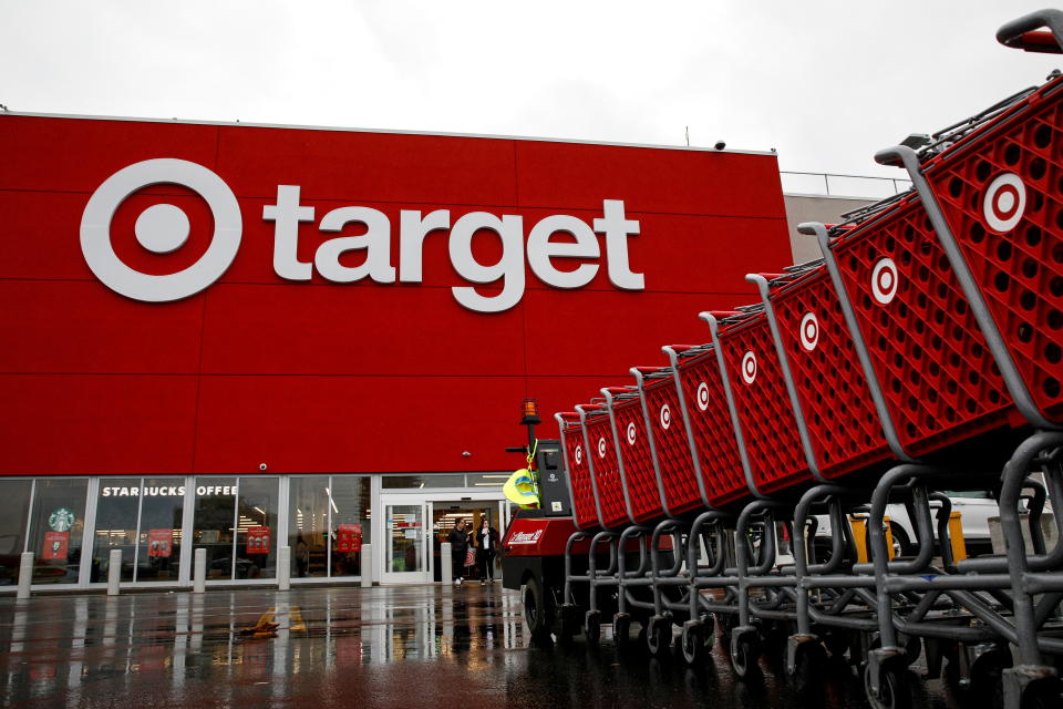 Shoping carts are wheeled outside a Target Store during Black Friday sales in Brooklyn, New York, U.S., November 26, 2021.  REUTERS/Brendan McDermid