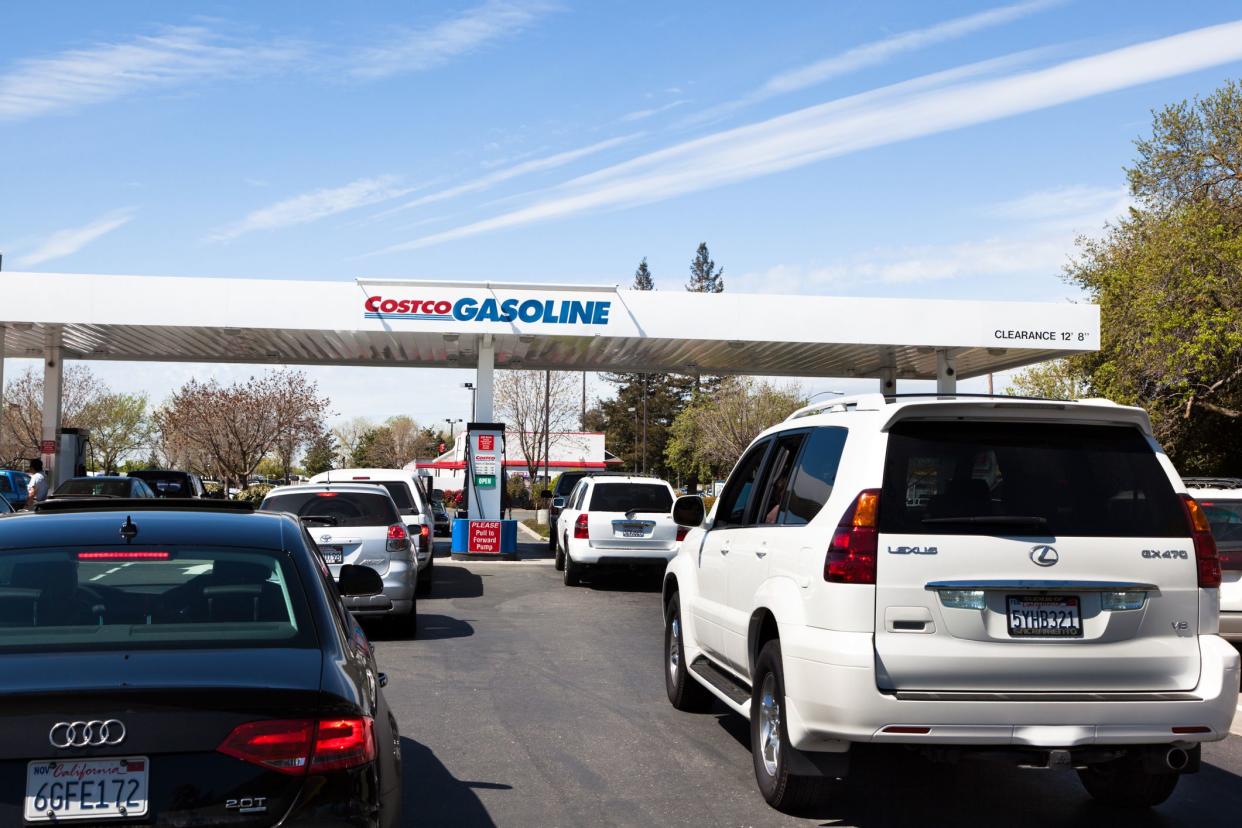 Rancho Cordova, California, USA - April 5, 2011: Vehicles waiting in multiple lines for the gasoline at Costco, members only, gas station. Costco is known for discounted prices on its merchandise.