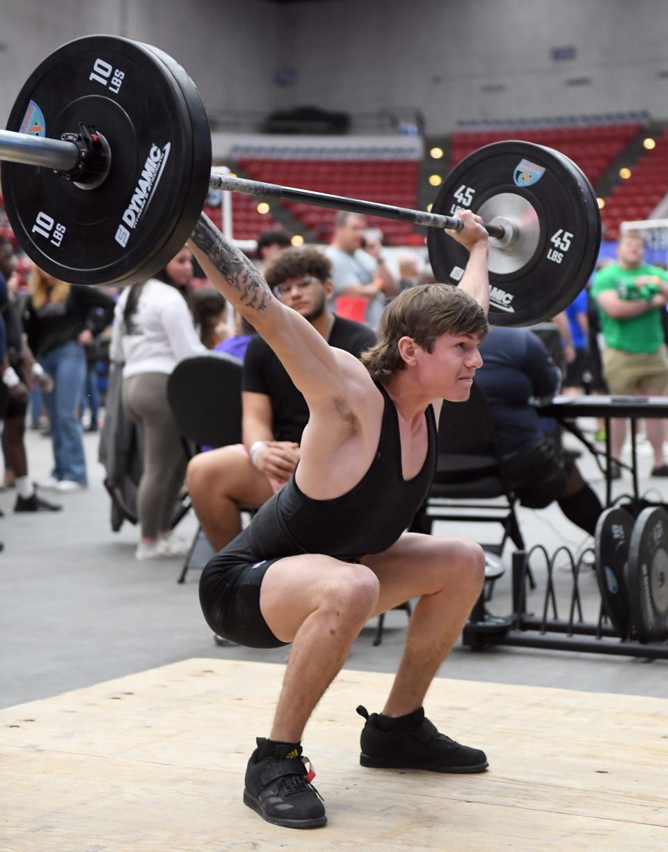 Alex Norman of Trenton High School lifts in Class 1A 119 during the FHSAA Boys Weightlifting State Championships at the RP Funding Center in Lakeland, Fl on Saturday April 20, 2024. Scott Wheeler | Photo