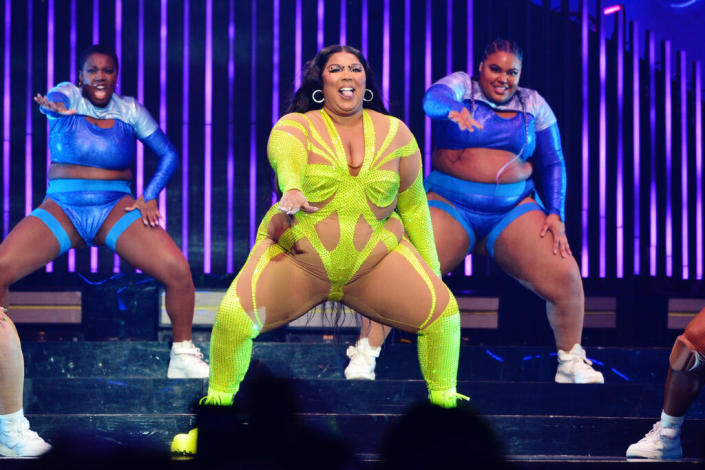 lizzo embraces her c\natural curves and tells every Black woman to do the same