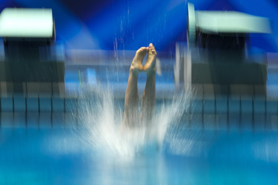 Maori Pomeroy-Farrell of Fiji dives during the 1m Springboard Men at the World Swimming Championships in Fukuoka, Japan, Friday, July 14, 2023. (AP Photo/Lee Jin-man)