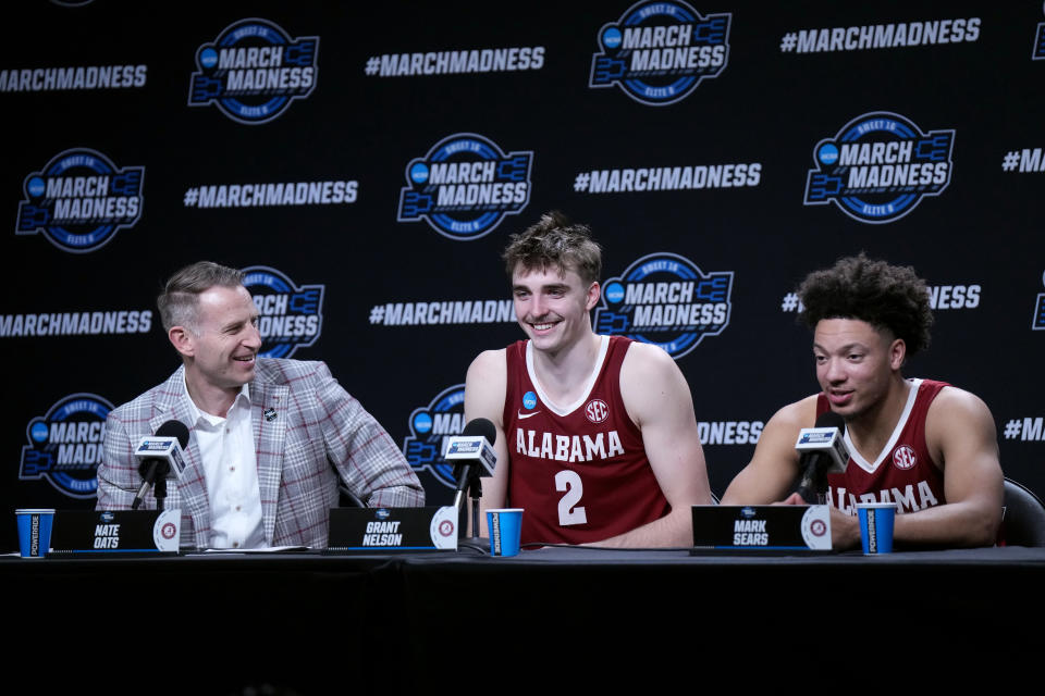 Mar 28, 2024; Los Angeles, CA, USA; Alabama Crimson Tide head coach Nate Oats talks with forward Grant Nelson (2) and guard Mark Sears (1) in a press conference after the game against the North Carolina Tar Heels. and in the semifinals of the West Regional of the 2024 NCAA Tournament at Crypto.com Arena. Mandatory Credit: Kirby Lee-USA TODAY Sports