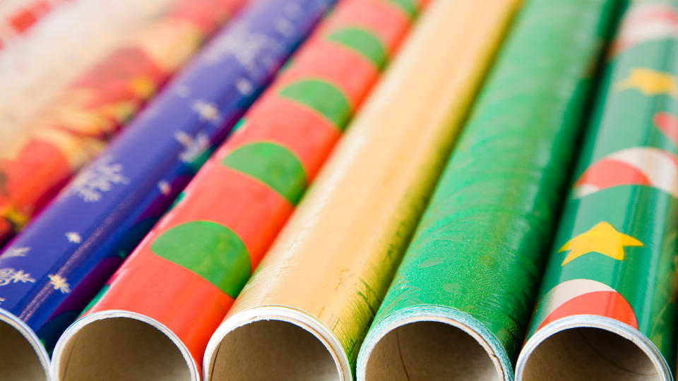 Rolls of colorful wrapping paper for Christmas/New Year gifts.