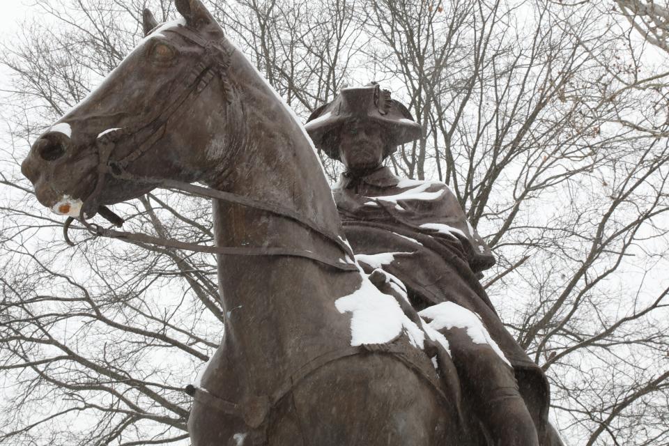 The statue of George Washington is covered with snow this afternoon as it sits across the street from Washington's Headquarters in Morristown on Feb. 20, 2018.