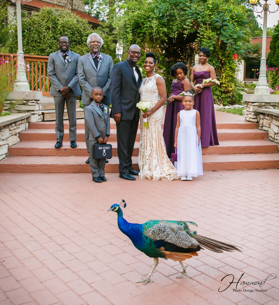 The wedding party included (from left to right): Denzel Goins (the bride&rsquo;s son), Albert Conway (the groom's father and best man), Joshua Stoxstell (the bride's nephew and ring bearer), Emile and Tamatha Conway (the newlyweds), Kaitlyn Conway (the groom's daughter and junior bridesmaid), Akira Jarmon (the bride's niece and flower girl), and Tracey Jarmon (the bride's sister and maid of honor.) (Photo: Hammond Photo Design Studios)