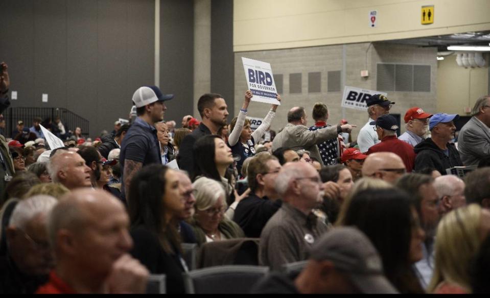 Delegates at the Washington State GOP convention in Spokane shout down party officials after the announcement that they would not be endorsing a gubernatorial candidate.