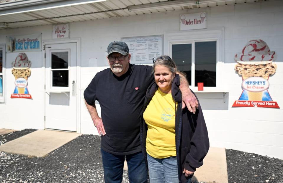 Owners of Sweet Dreams Ice Cream Shop Gary and Tiny Hicks pose for a photo outside the Snow Shoe shop as they start to prepare for the season on March 14, 2024.