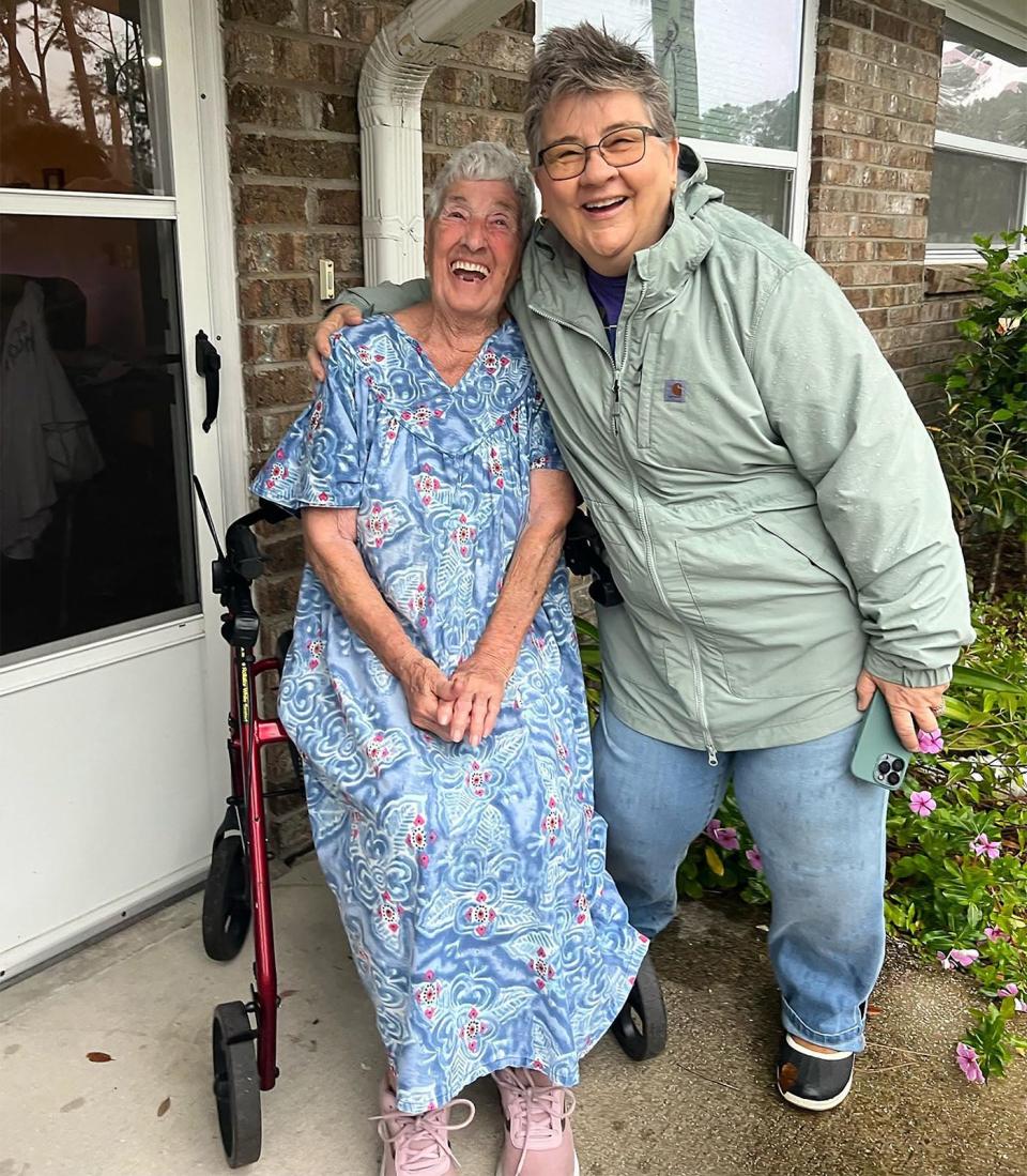 Malea Guiriba, right, founder and executive director of Pie in the Sky Community Alliance, shares a laugh with client Helen Carlock. The. nonprofit works to end senior hunger in St. Johns County.