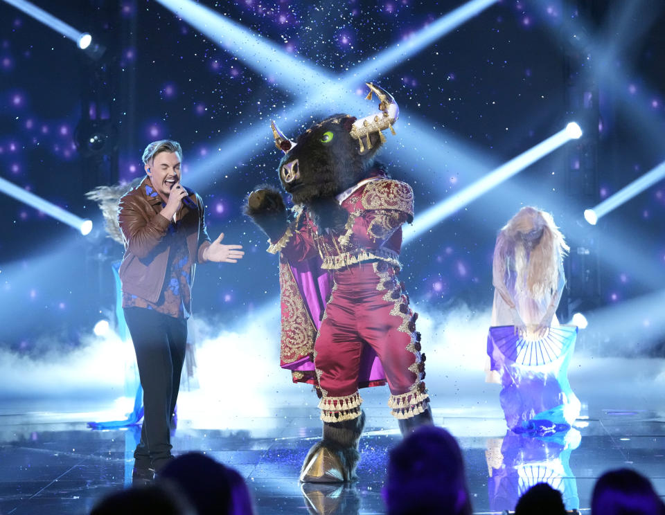 Jesse McCartney and Bull, “The Masked Singer” - Credit: Fox