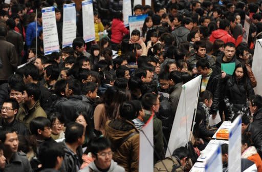 Thousands of jobseekers flock to a job fair in Hefei, east China's Anhui province on February 25, 2012. Chinese leaders frequently talk about the need to reform the country's economic model, partly by reducing its heavy reliance on exports and increasing domestic consumption