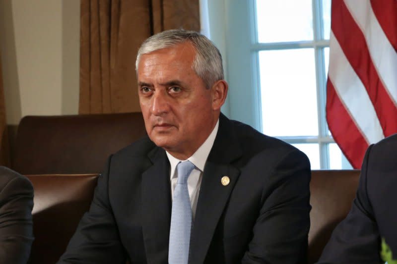 U.S. President Barack Obama (R) meets with President Otto Perez Molina (C) of Guatemala and President Salvador Sanchez Ceren (L) of El Salvador in the Cabinet Room of the White House in Washington, D.C., on July 25, 2014. On January 14, 2012, Molina was sworn in as Guatemala's president. File Photo by Alex Wong/UPI