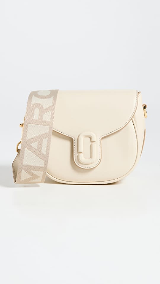 <p><a href="https://go.redirectingat.com?id=74968X1596630&url=https%3A%2F%2Fwww.shopbop.com%2Fsmall-saddle-bag-marc-jacobs%2Fvp%2Fv%3D1%2F1543139144.htm&sref=https%3A%2F%2Fwww.cosmopolitan.com%2Fstyle-beauty%2Ffashion%2Fg43376665%2Fsaddle-bags%2F" rel="nofollow noopener" target="_blank" data-ylk="slk:Shop Now;elm:context_link;itc:0;sec:content-canvas" class="link ">Shop Now</a></p><p>Marc Jacobs The Small Saddle Bag</p><p>$375.00</p><p>shopbop.com</p>