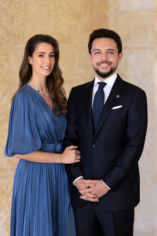 Royal Hashemite Court/Albert Nieboer/picture-alliance/dpa/AP Images Princess Rajwa and Crown Prince Hussein's engagement portrait