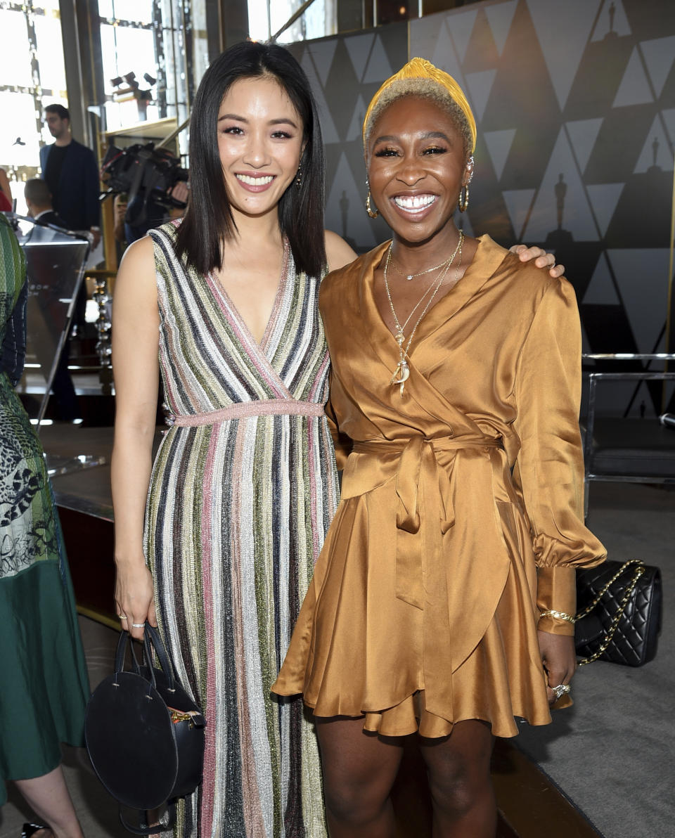 Actors Constance Wu, left, and Cynthia Erivo attend the Academy of Motion Picture Arts and Sciences Women's Initiative New York luncheon at the Rainbow Room on Wednesday, Oct. 2, 2019, in New York. (Photo by Evan Agostini/Invision/AP)