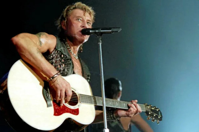 Johnny Hallyday à Bercy en 1995.  - Credit:PHOTOTHEQUE LECOEUVRE / Collection ChristopheL via AFP