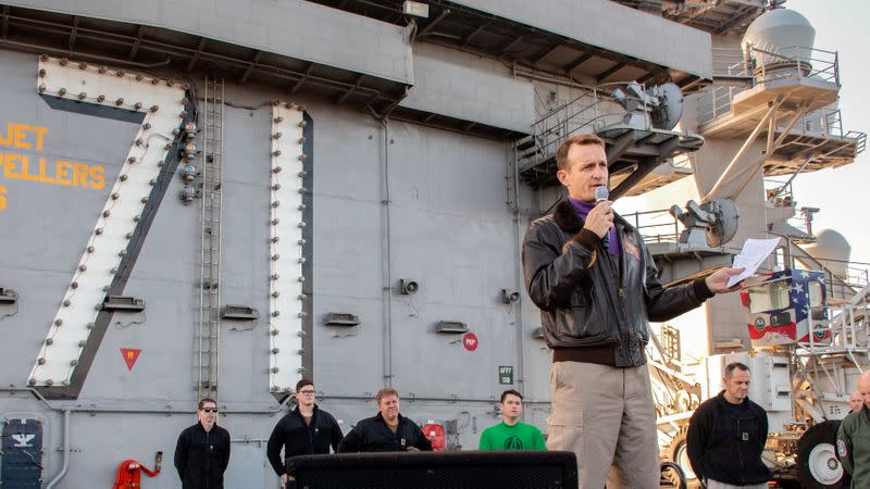 Captain Brett Crozier, commanding officer of the U.S. Navy aircraft carrier USS Theodore Roosevelt, speaks at sea