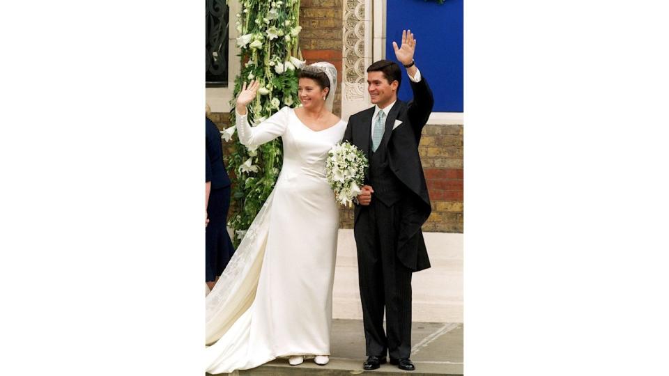 Princess Alexia Of Greece And Carlos Morales Quintana waving on their wedding day