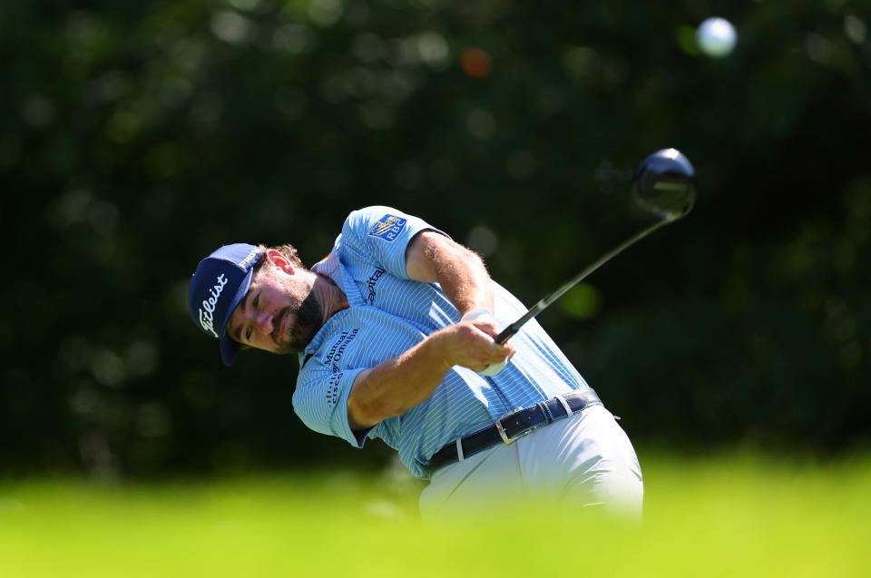 Cameron Young hits a driver off the tee