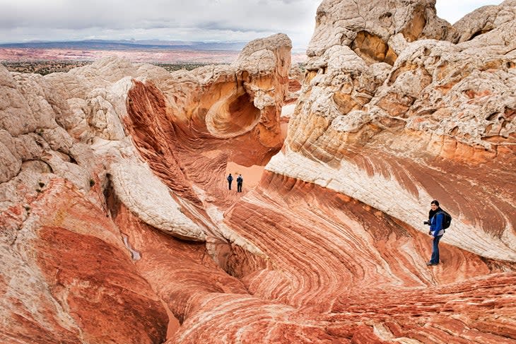 Hikers at White Pocket, Vermillion Clifffs National Monument