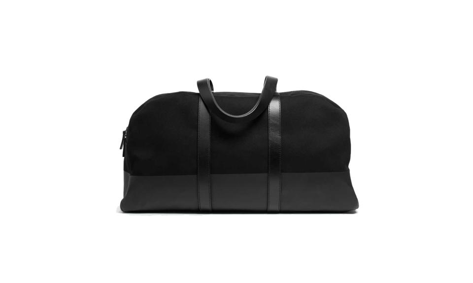 <p>The Twill Weekender, $115, <a rel="nofollow noopener" href="https://www.everlane.com/products/womens-dipped-weekender-blackblack?collection=womens-backpacks-bags" target="_blank" data-ylk="slk:everlane.com;elm:context_link;itc:0;sec:content-canvas" class="link ">everlane.com</a> </p>