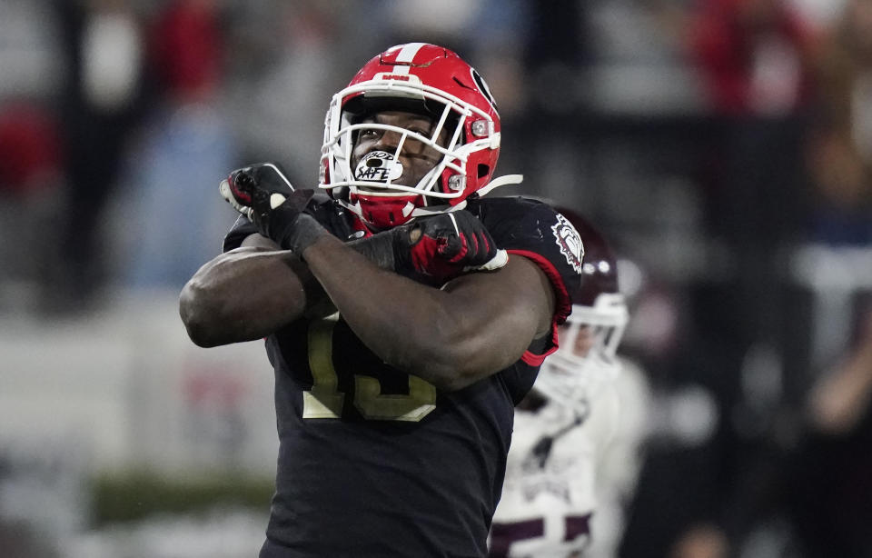 Georgia linebacker Azeez Ojulari (13) celebrates after a sack during the second half of an NCAA college football game against Mississippi State, Saturday, Nov. 21, 2020, in Athens, Ga. Ojulari was selected in the second round of the 2021 NFL football draft by the New York Giants. (AP Photo/Brynn Anderson)