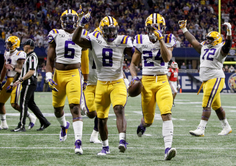 LSU cornerback Derek Stingley Jr. (24) celebrates after his second interception versus Georgia during the Southeastern Conference championship at Mercedes-Benz Stadium on Saturday, Dec. 7, 2019 in Atlanta.(C.B. Schmelter/Chattanooga Times Free Press via AP)