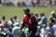 Tiger Woods walks up the ninth fairway during the final round at the Masters golf tournament on Sunday, April 10, 2022, in Augusta, Ga. (AP Photo/David J. Phillip)