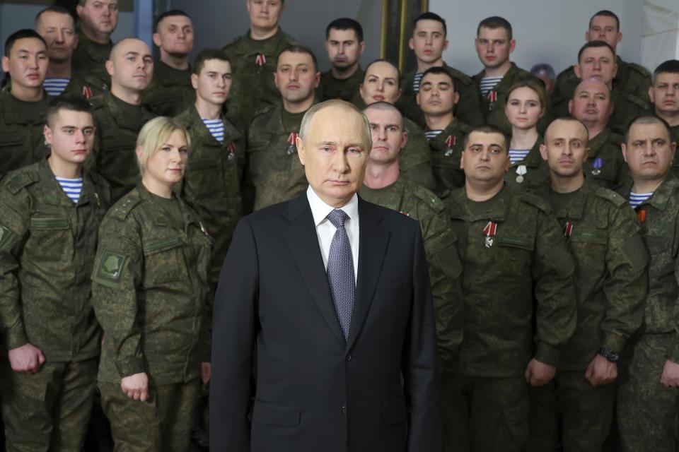 President Vladimir Putin speaks at his annual televised New Year's message after a ceremony during his visit to the headquarters of the Southern Military District, at an unknown location in Russia, Saturday, Dec. 31, 2022. In Putin's view, an aggressive West wants to crush Russia amid its invasion of Ukraine. His narrative, along with increasingly repressive measures to stifle domestic dissent, has galvanized patriotic support among many of his countrymen. (Mikhail Klimentyev, Sputnik, Kremlin Pool Photo via AP, File)