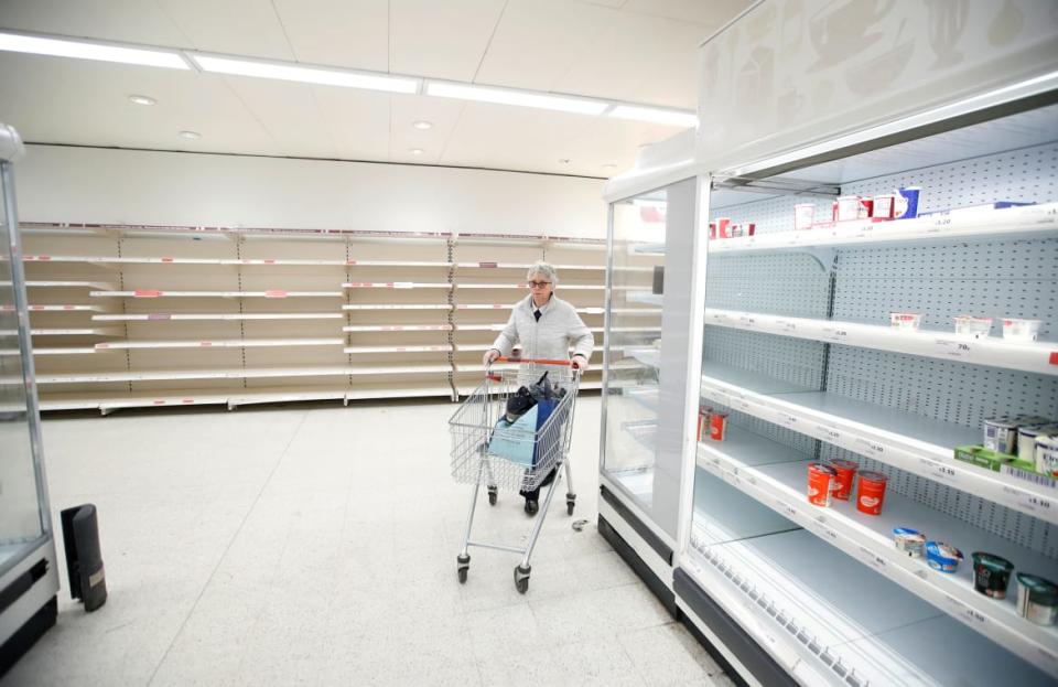 <div class="inline-image__caption"><p>The Year We Hoarded All the Toilet Paper: A customer pushed her trolley next to empty shelves at a Sainsbury's store during the coronavirus disease (COVID-19) outbreak, in Harpenden, Britain, March 18, 2020.</p></div> <div class="inline-image__credit">Peter Cziborra/Reuters</div>