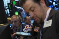 Traders work on the floor of the New York Stock Exchange May 2, 2014. REUTERS/Brendan McDermid