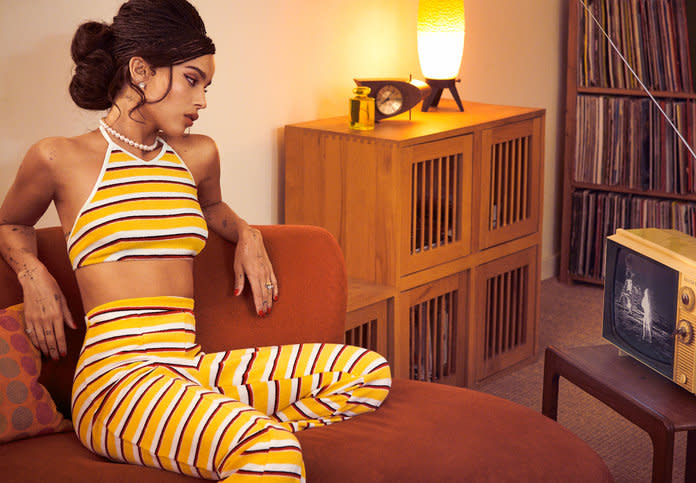 <p><em>Zoë Kravitz in a Solid & Striped top and trousers, Turner & Tatler by Cindy Chaplin pearl studs, her own earrings, a Sophie Buhai necklace, and her own rings. Photo: Pamela Hanson/LGA Management</em></p>