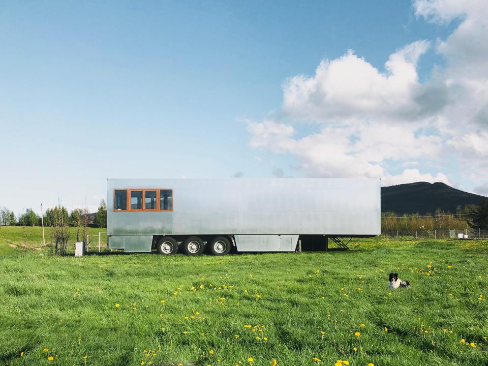 the Good Spot mobile hotel on a field